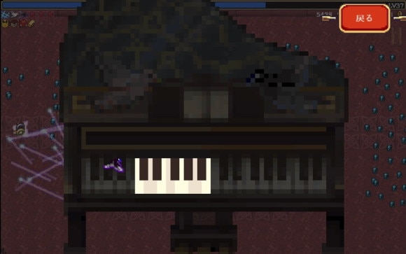 ピアノの鍵盤を押す